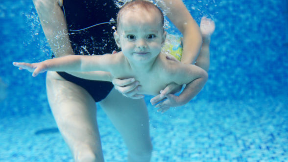 Little Boy Learning to Swim