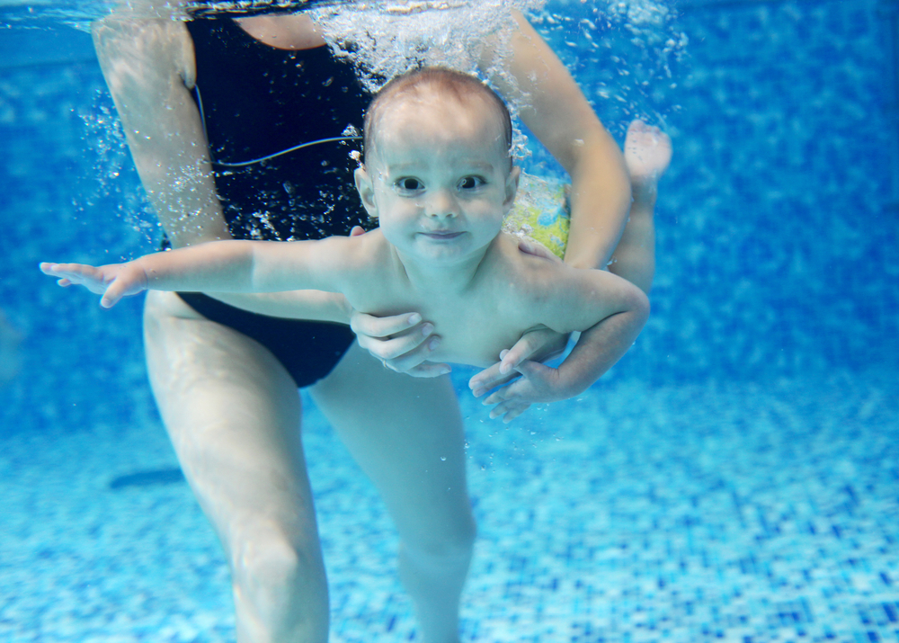 Little Boy Learning to Swim